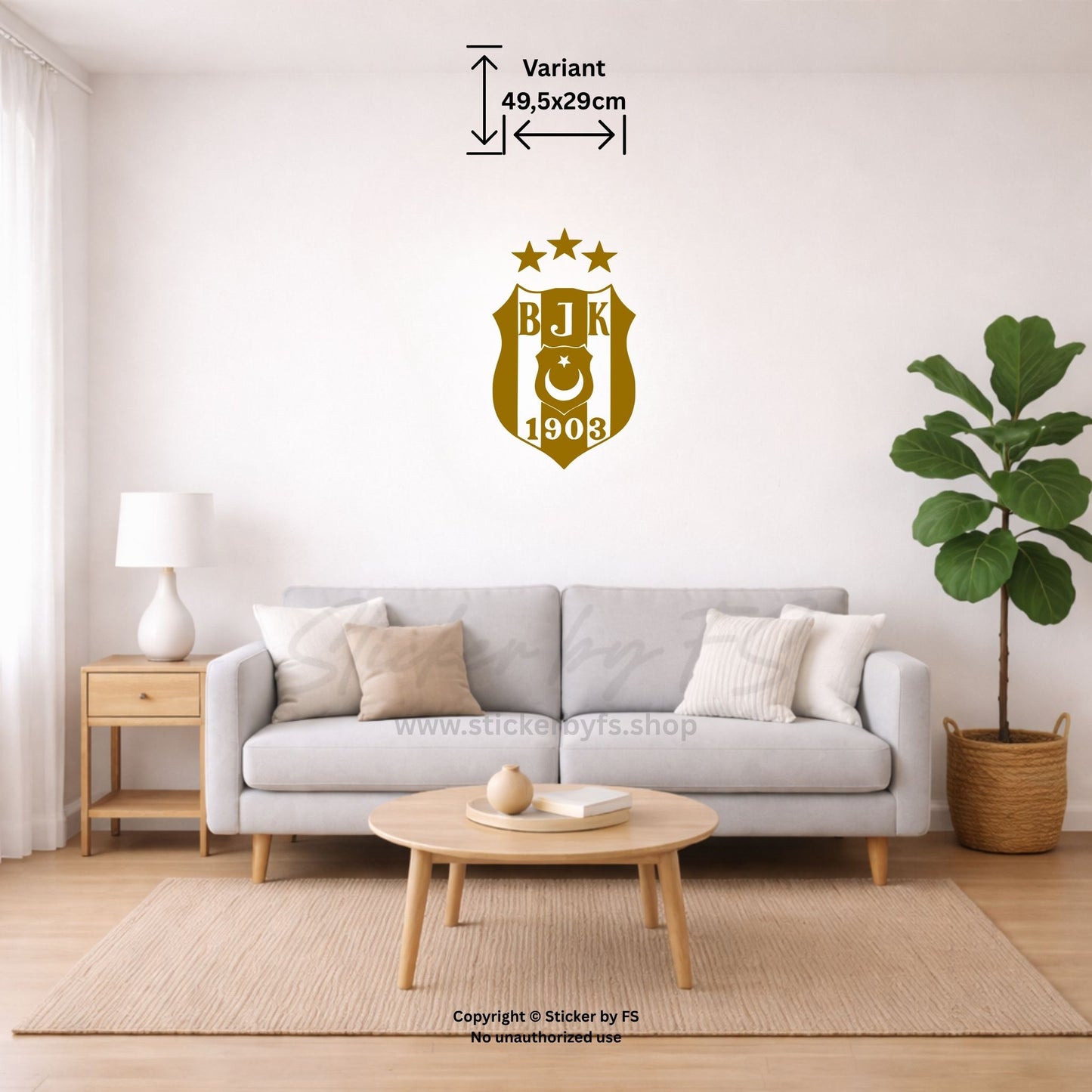 Besiktas Wandtattoo in Gold als großes Wandmotiv über grauem Sofa im modernen Wohnzimmer – stilvoller Fußball Wandsticker für Beşiktaş Fans