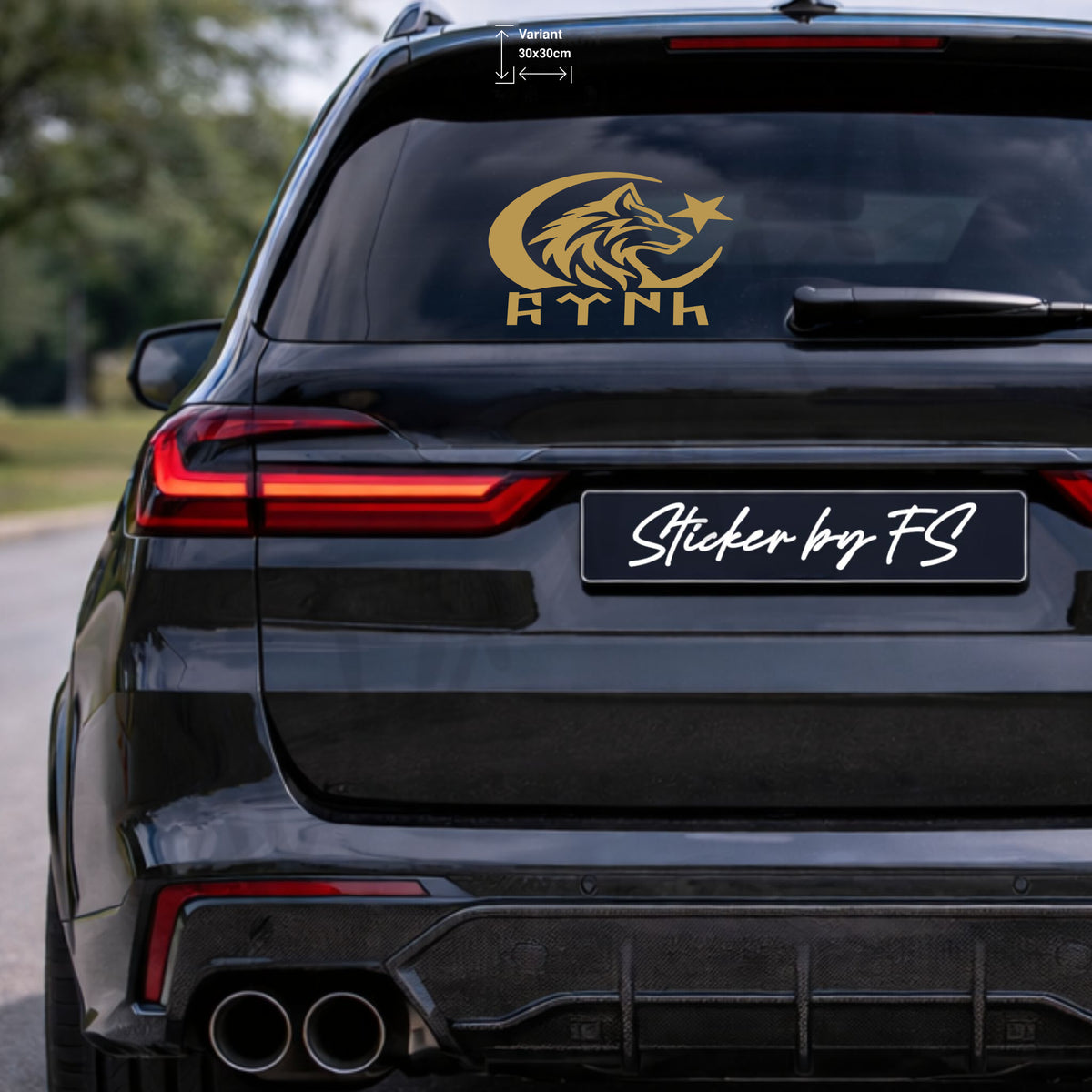 Goldfarbene 30 × 30 cm Variante auf der hinteren Autoscheibe; Wolf, Halbmond und Stern bilden eine zusammenhängende Silhouette.