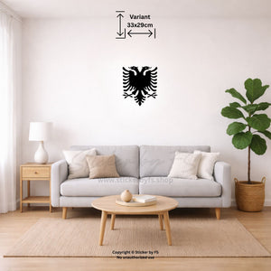 Schwarzes Albanien Flagge Wandtattoo mit Doppeladler über beigem Sofa im Wohnzimmer – moderner Wandsticker für stilvolle Wohnräume