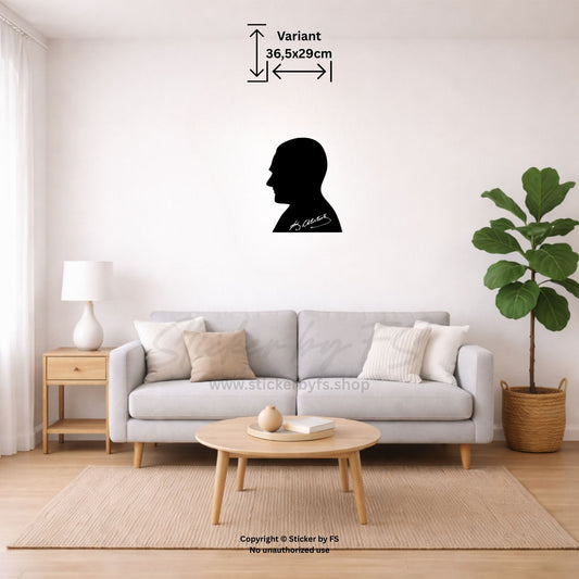 Schwarzes Kemal Atatürk Wandtattoo als markante Silhouette über beigem Sofa im Wohnzimmer – dekorativer Wandsticker für moderne Räume