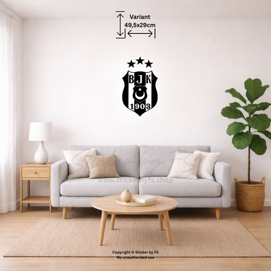 Besiktas Wandtattoo in Schwarz als großes Wandmotiv über grauem Sofa im modernen Wohnzimmer – stilvoller Fußball Wandsticker für Beşiktaş Fans